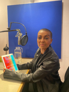 The amazing and fabulous Adjoa Andoh sits in a recording studo with a copy of Translation State